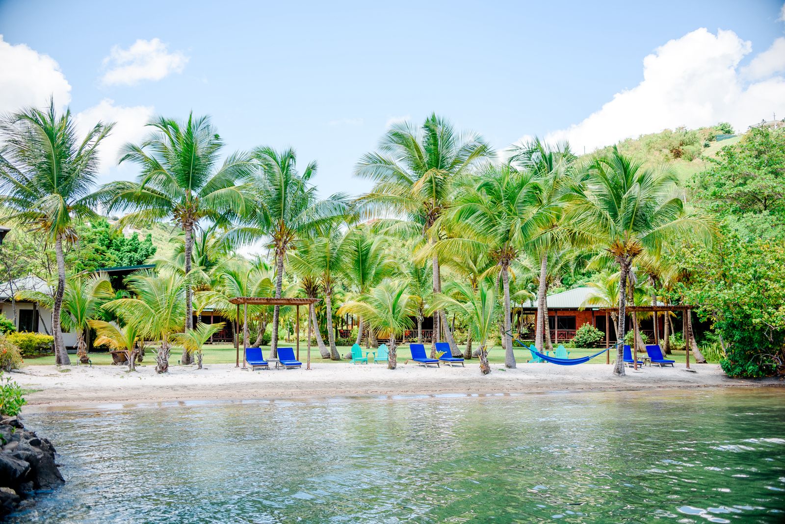 Beach cottages with palm trees and hammocks at best places for investment properties